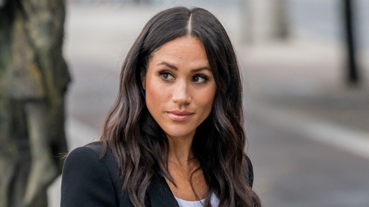 Меган Маркл в День влюбленных показала редкий кадр с дочкой на руках у принца Гарри (фото)